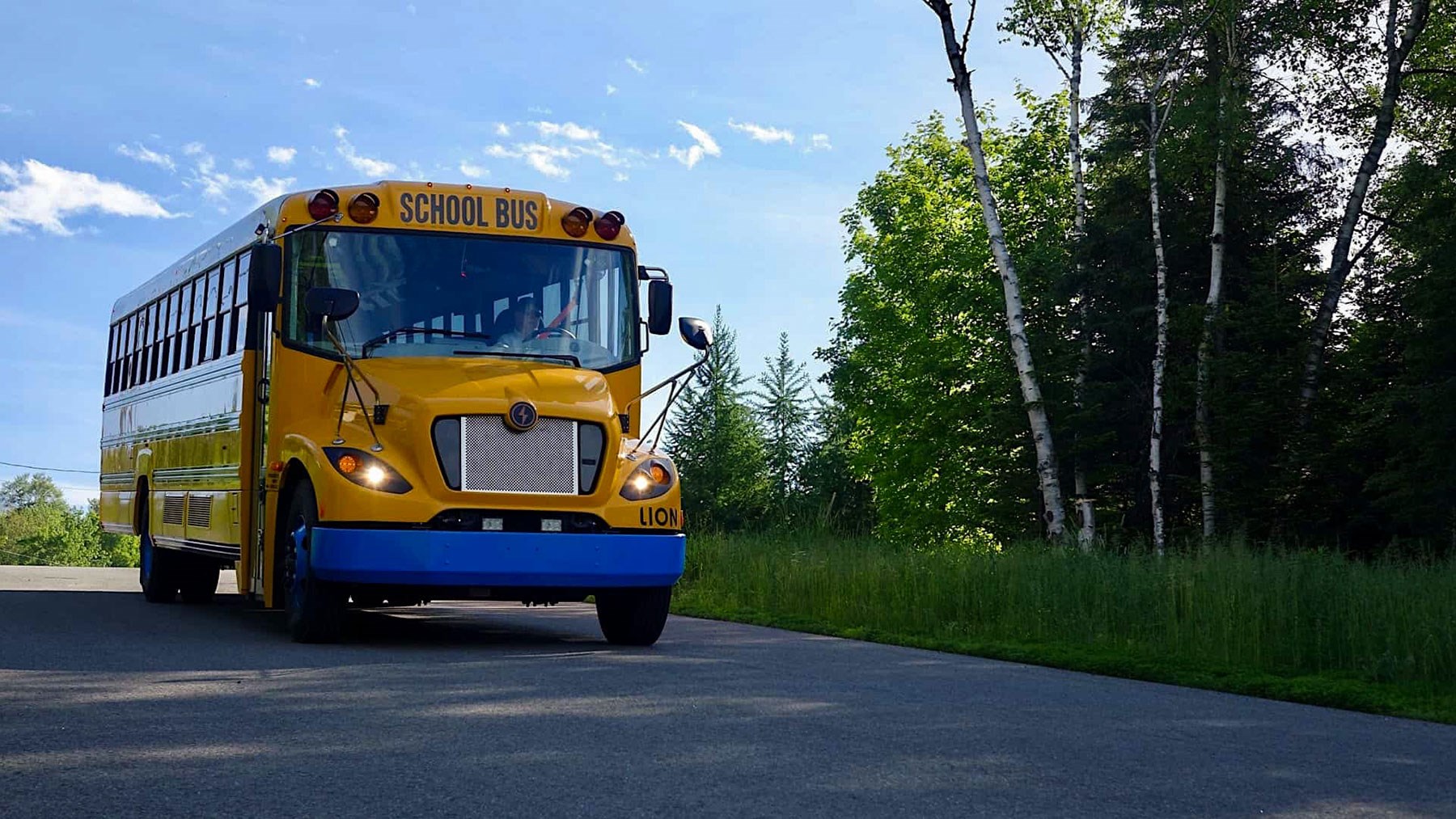 a photo from What if you could reduce costs and increase reliability through electric school buses? 